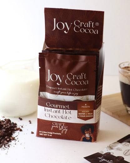 BOx of Joy Craft Cocoa Single Packs of gourmet instant hot chocolate mixes