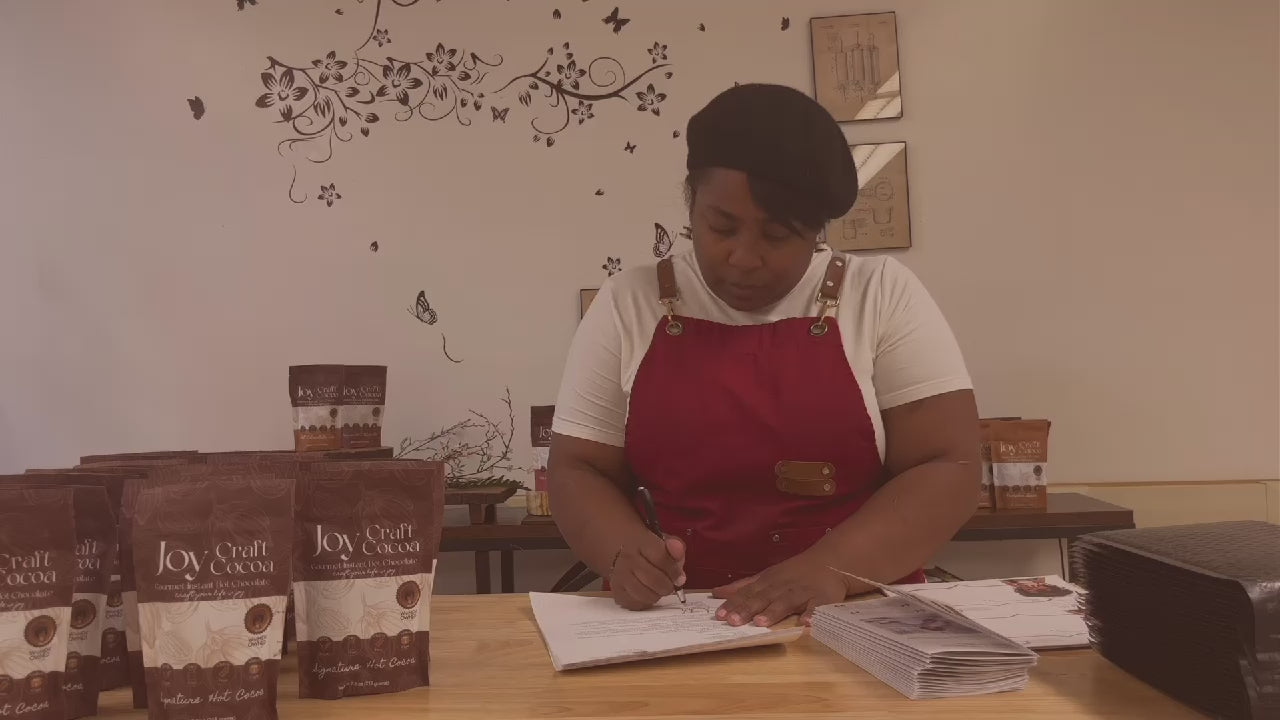 Load video: Video of Chef Saidah Farrell sending out bags of hot chocolate